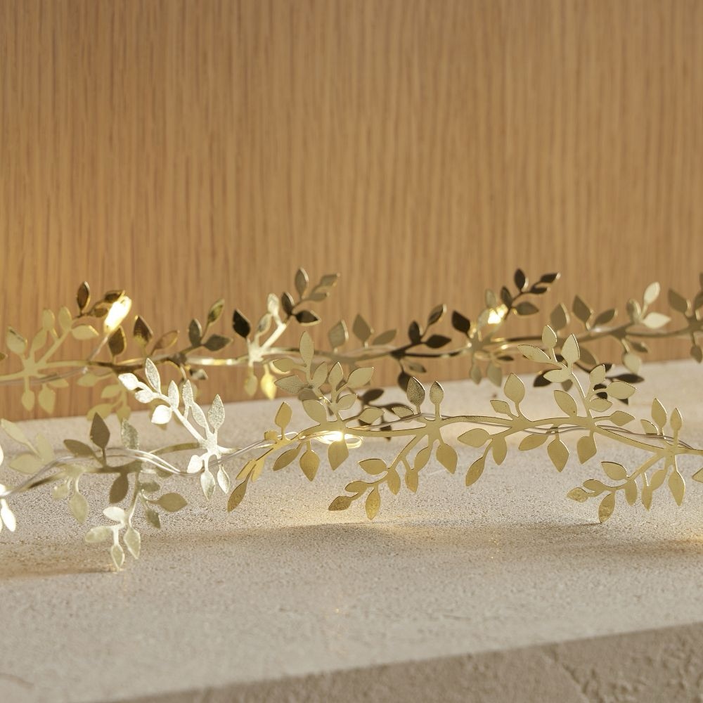 West Elm LED Gold Metal Leaf Garland and Silver String Lights